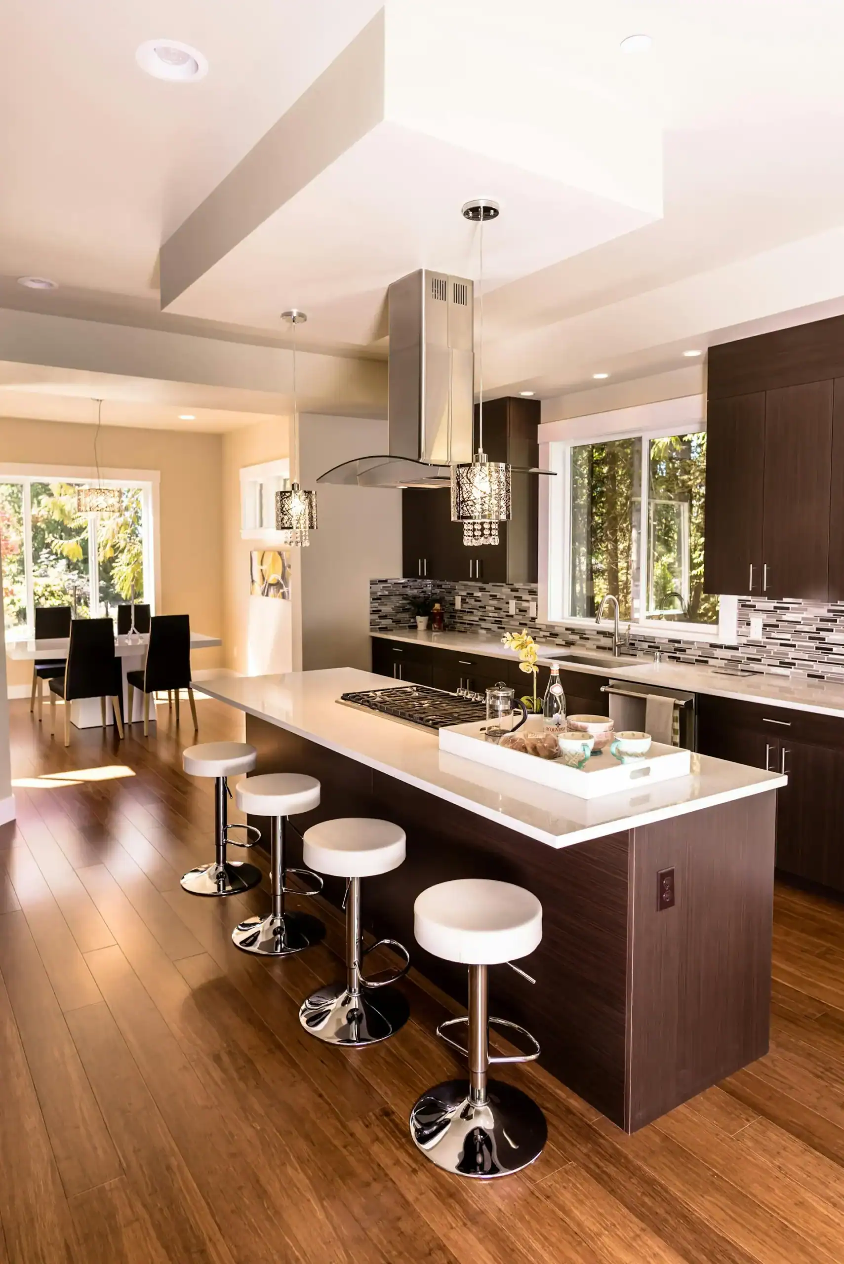 Custom kitchen island table with matching cabinets and luxury open kitchen design
