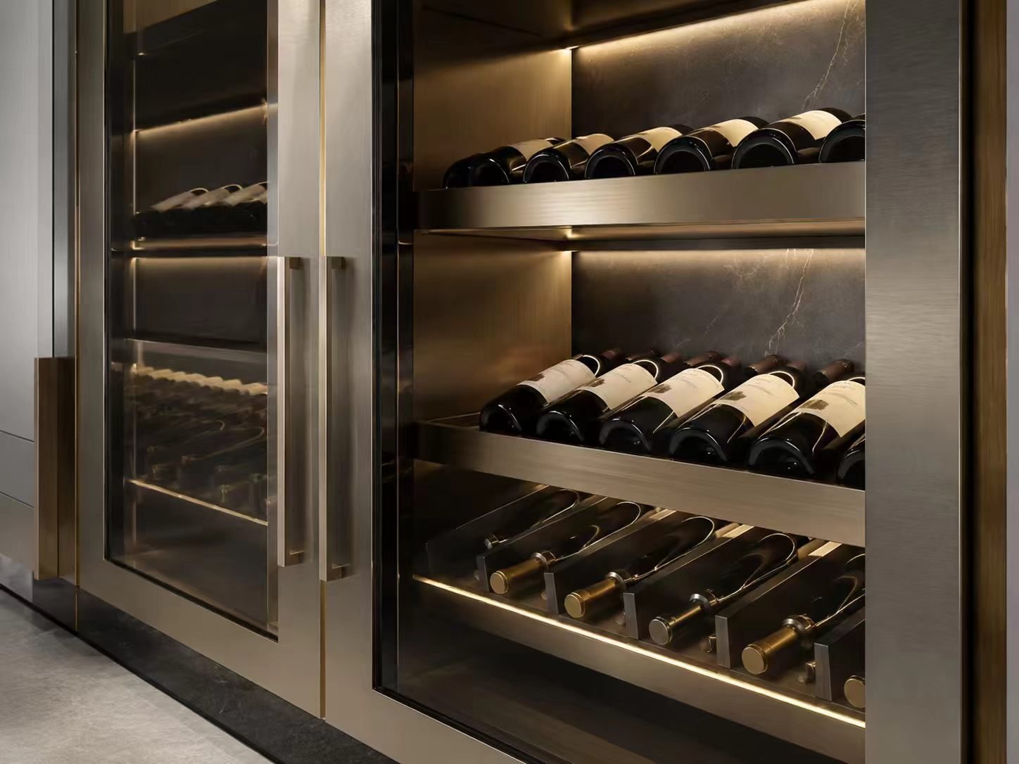 stainless steel wine cabinet material detail with warm lighting and bottle display