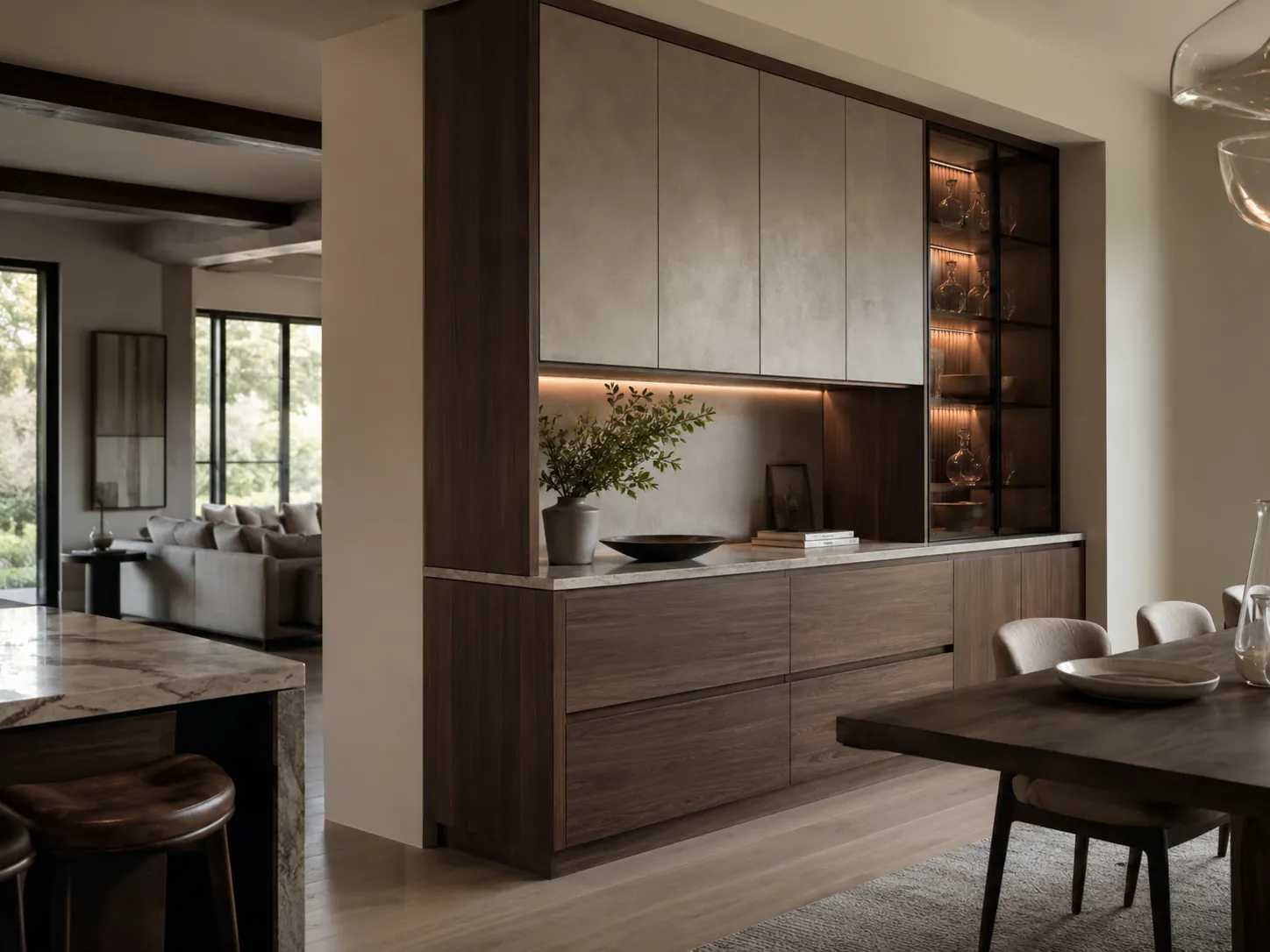 Custom sideboard cabinet connecting an open kitchen, dining table, and living space.