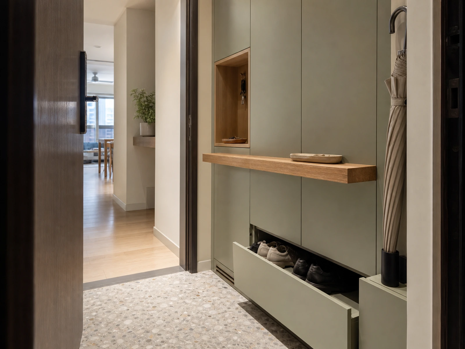 Shallow entry cabinet with shoe storage and a clear apartment walkway